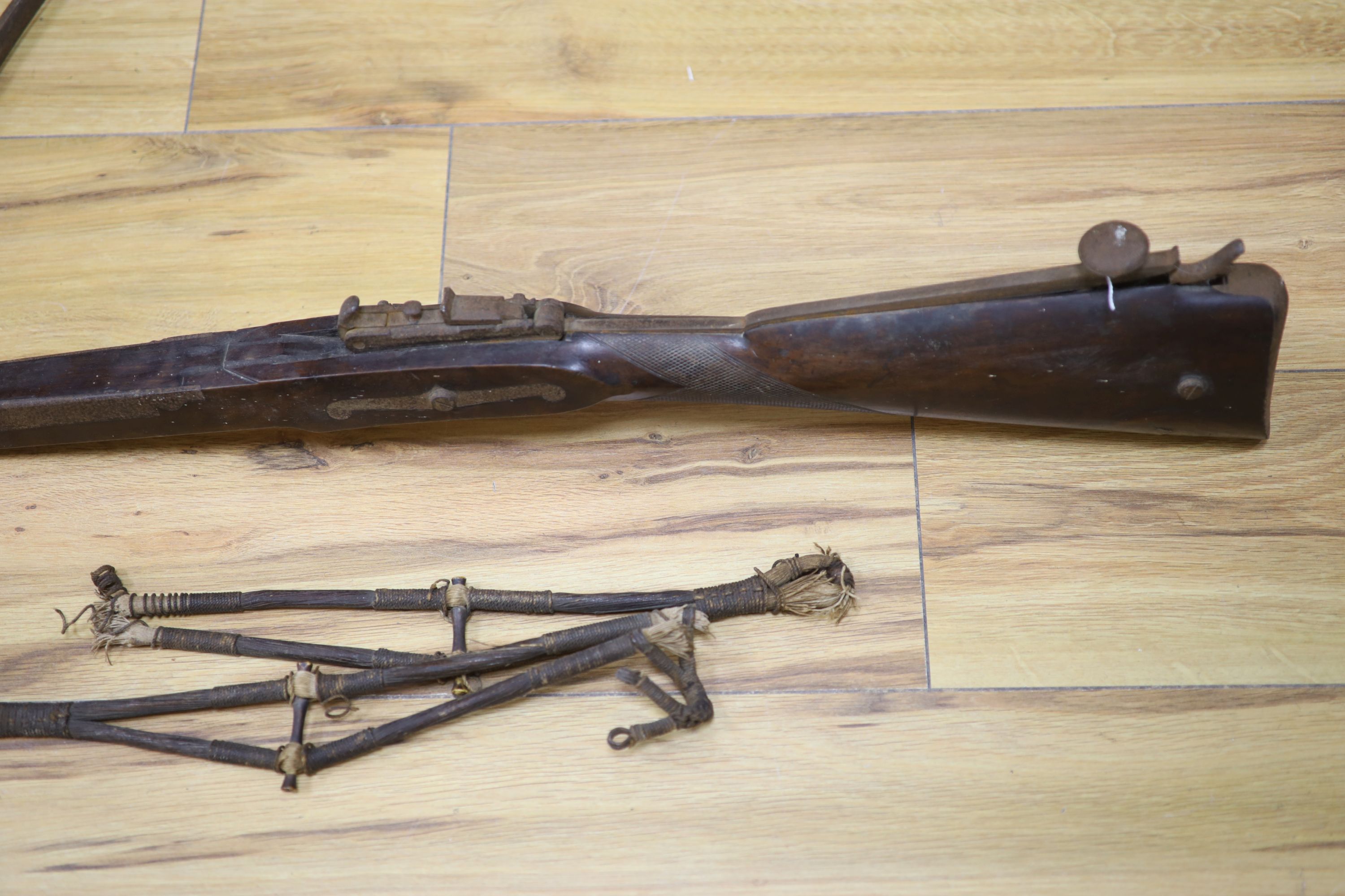 A 19th century steel and walnut crossbow